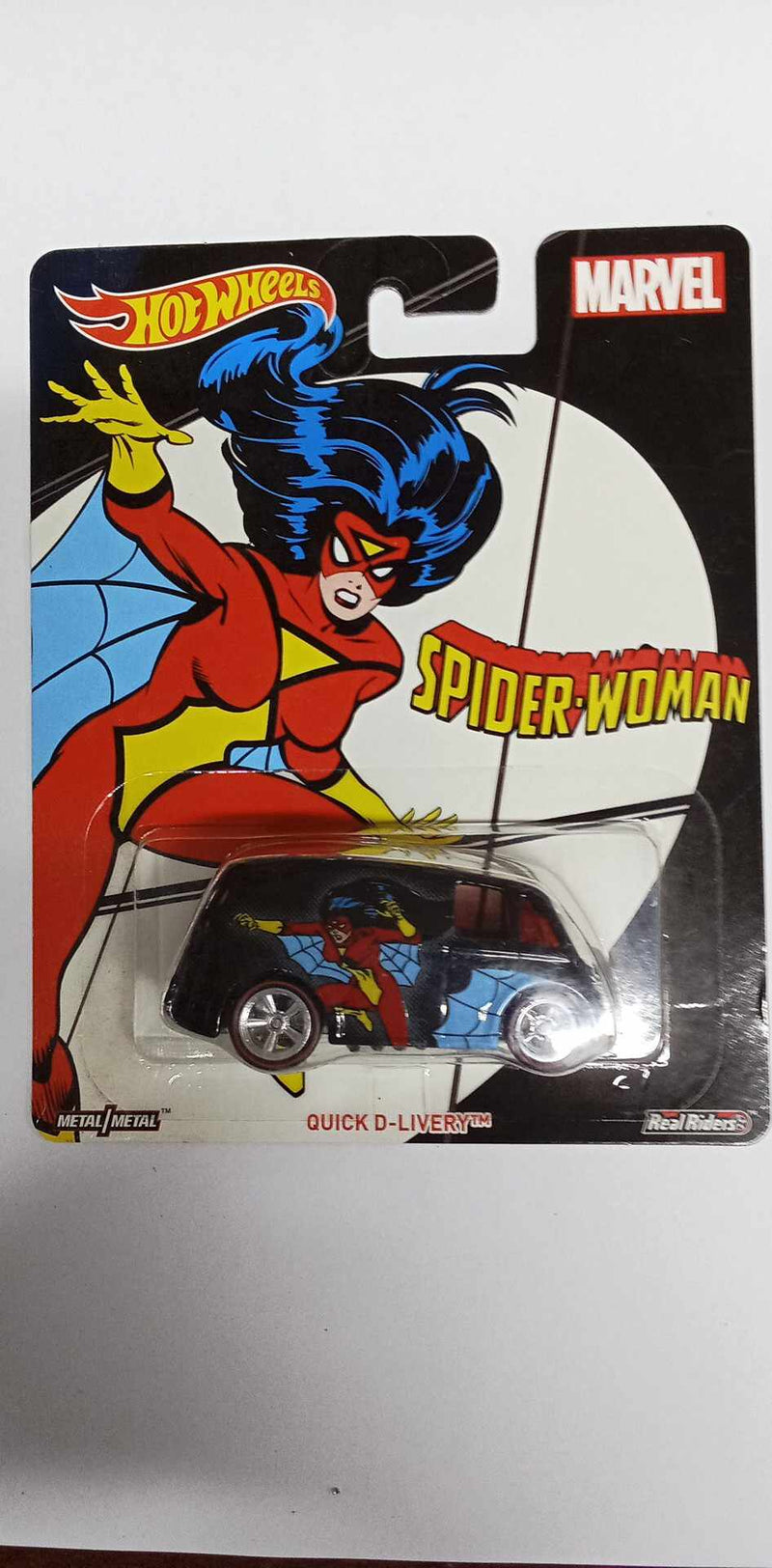 Hot Wheels- Pop Culture -Quick D-Livery -Black Spider-Woman (DWH26)